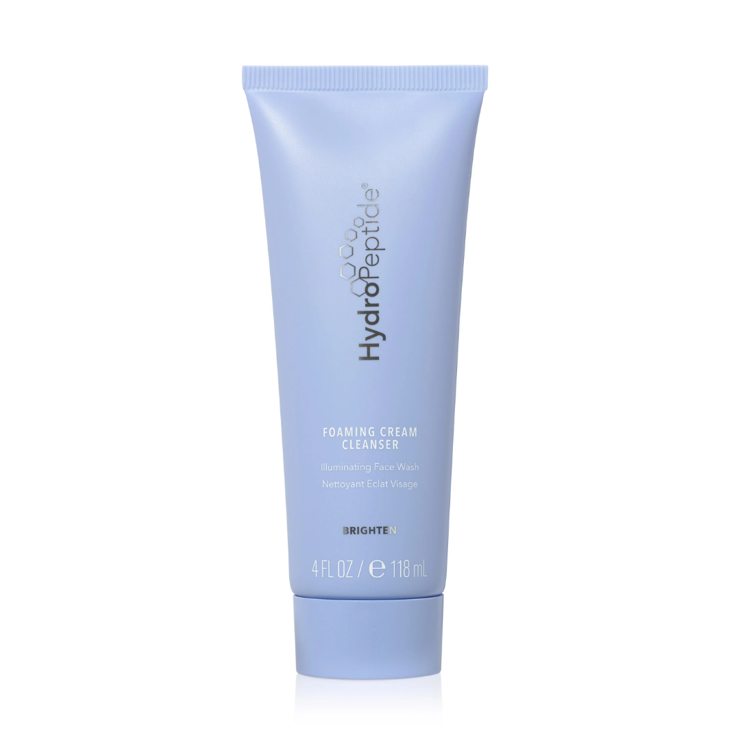 Foaming-Cream-Cleanser - Dr Hans Clinics Blue Hydropeptide Foaming Cream Cleanser tube standing upright, labeled Illuminating Face Wash (118 ml).