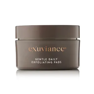 Exuviance Gentle Daily Exfoliating Pads jar with copper logo on a brown container