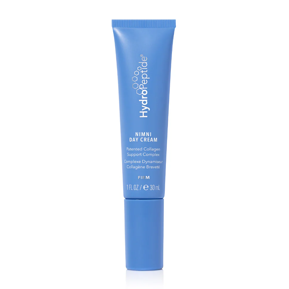 HydroPeptide_Nimini - Dr Hans Clinics Blue tube of Nimni Day Cream by HydroPeptide with white text, standing upright on white background.