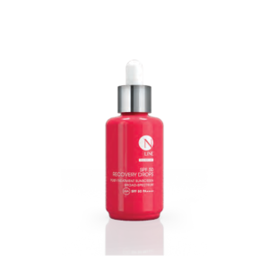 Red bottle labeled 'N Line' recovery drops sunscreen with a dropper, SPF 50, on a reflective surface.