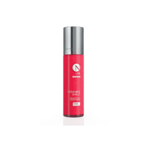 Pink bottle of N Line Ceramide Shield Restorative Moisturiser with a silver cap, standing upright on a white background.
