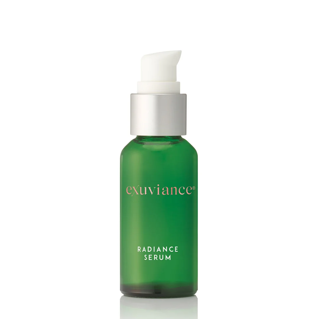 RadianceSerum_Primary - Dr Hans Clinics Green glass serum bottle with a white pump, labeled 'exuviance' and 'Radiance Serum' on a white background